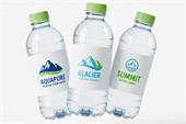 Water bottle labels on clear plastic bottles featuring Aquapure, Glacier, and Summit mountain spring designs.