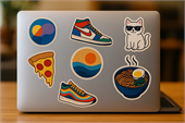 Laptop stickers with colourful artwork designs including trainers, cat, pizza, ramen, and abstract graphics