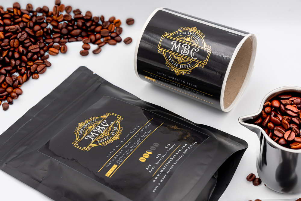 Coffee labels for MBC Latin American Blend featuring a black and gold design with elegant typography for a premium roasted coffee look.